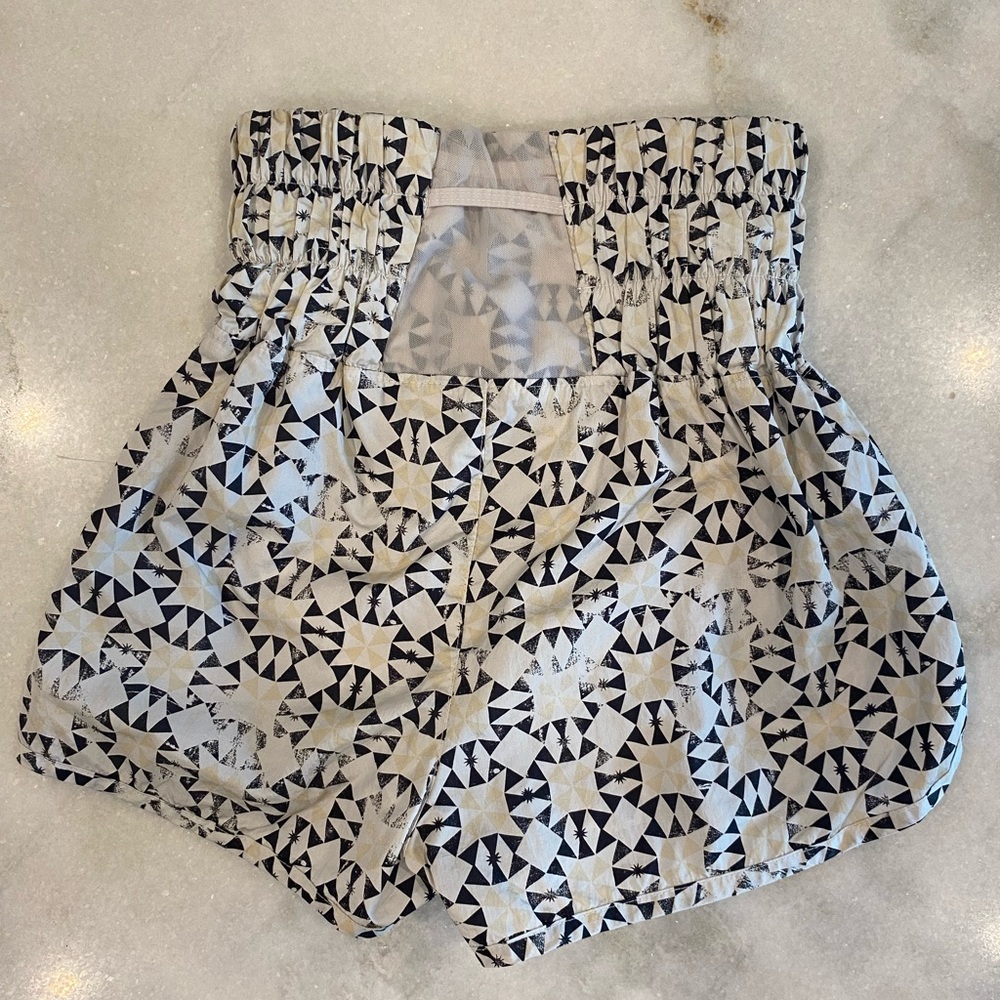 Free People Movement The Way Home Shorts with a black, yellow, and white pattern